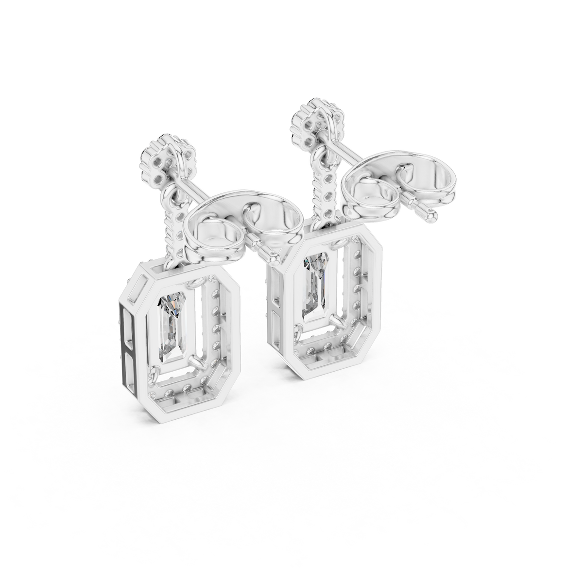 White gold emerald-cut diamond drop earrings, side view of rectangular settings