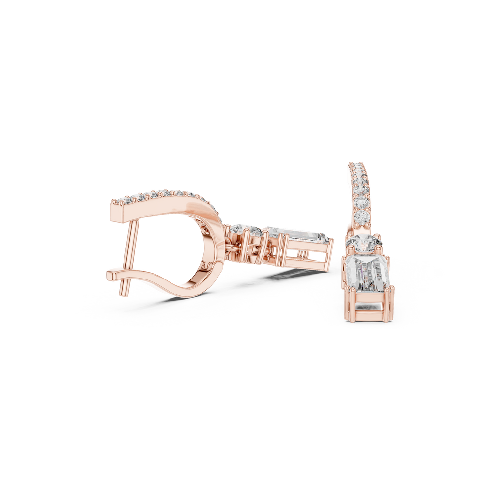 Rose gold drop earrings with rectangular center stones and pavé baguette details