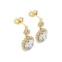 Oval diamond drop earrings in yellow gold with halo pavé accents and oval center stones
