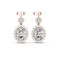 Rose gold-tone drop earrings with round halo stone and pavé dangling clusters