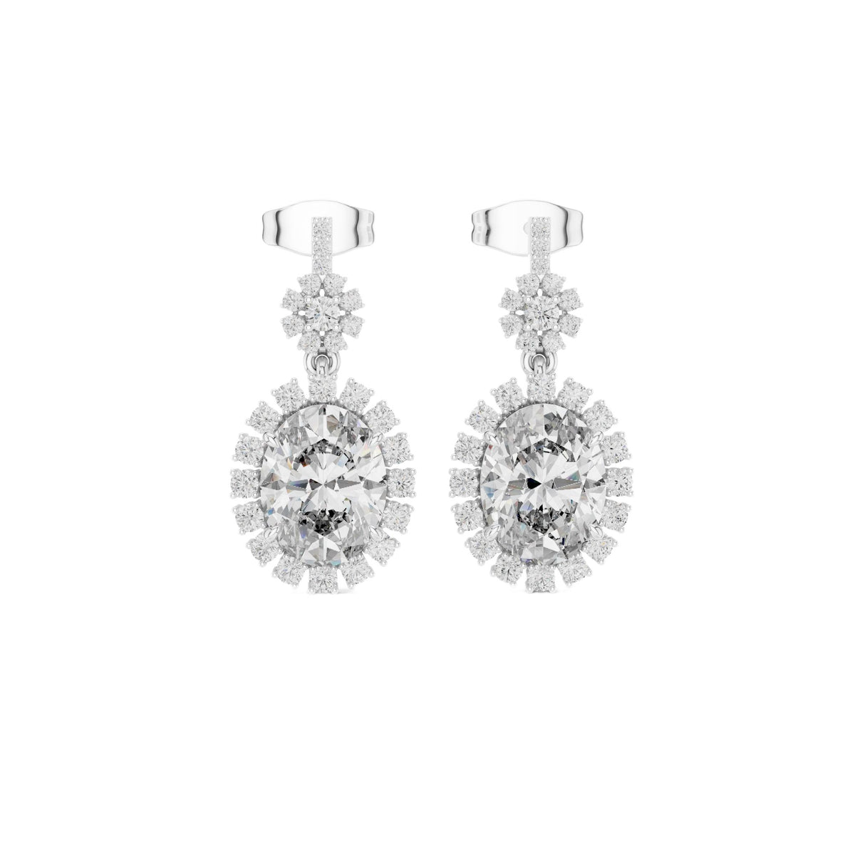 Oval diamond drop earrings in platinum with oval stones, halo clusters, and stud backs