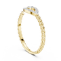 Gold diamond evil eye ring with round center stone and pavé eye motif on braided band
