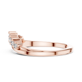 Rose gold curved diamond wedding band with round stones and stepped prong settings