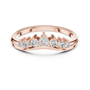 Rose gold round diamond curved wedding band, top view with five sparkling stones