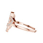 Rose gold diamond statement ring with round halo floral design, prong-set stones
