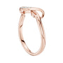 Rose gold infinity knot ring with open oval frame and small pavé-set stones