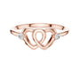 Rose gold diamond promise ring top view with heart pattern and round bezel-set stones