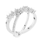 White gold diamond band ring with evenly spaced round stones across the top band