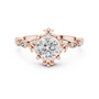 Rose gold engagement ring with round center diamond and sculpted crown setting