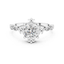 White gold engagement ring with round center diamond and sculpted crown setting