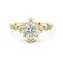 Yellow gold engagement ring with round center diamond and sculpted crown setting