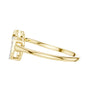 Yellow gold diamond ring with intertwined double hearts and round stones, side angle.