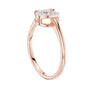 Rose gold diamond ring with intertwined heart centerpiece and pavé-set top stones