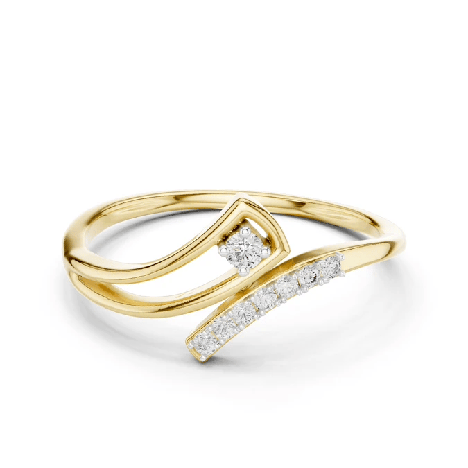Yellow gold asymmetric diamond wave ring with round center stone and pave bar