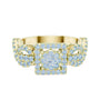 Yellow gold ring with square halo centerpiece and blue gemstone cluster, front view