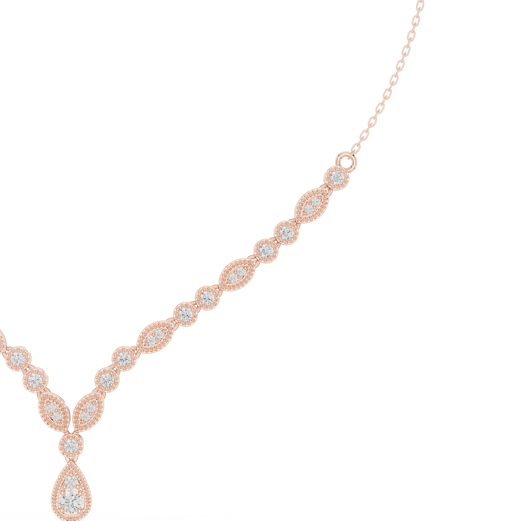 Rose gold V-shape diamond drop necklace close view of round stones and teardrop pendant