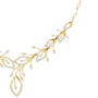 Floral V-shape diamond necklace detail with leaf-and-teardrop motifs, yellow gold.