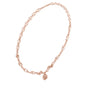 Rose gold diamond oval-link necklace with floral cluster pendant, close view