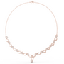 Rose gold necklace with round link row and blue accent stones, teardrop centerpiece pendant