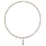 Rose gold emerald-cut diamond pendant on a line of baguette diamonds and prongs