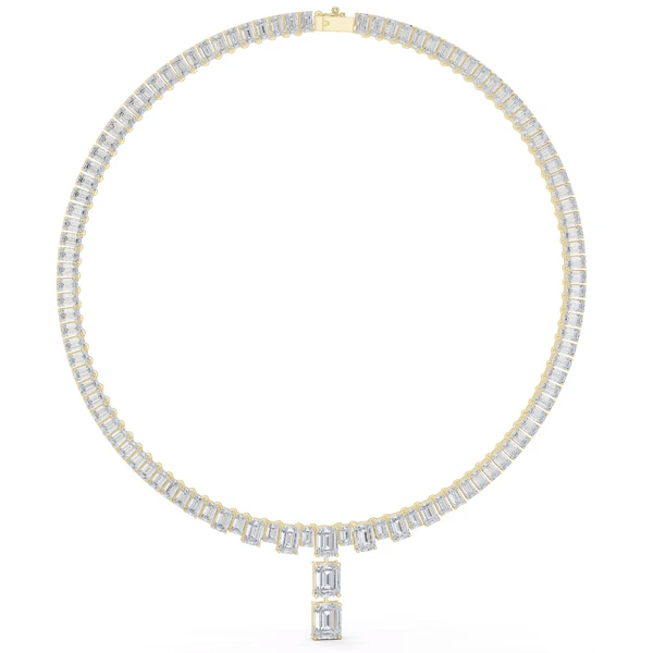 Emerald-cut diamond line necklace with yellow gold clasp and baguette link chain