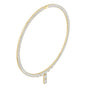 Yellow gold diamond line necklace with emerald-cut stones and a central emerald-cut pendant.