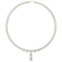 Yellow gold emerald-cut diamond line necklace with a central pendant and closely set station stones.