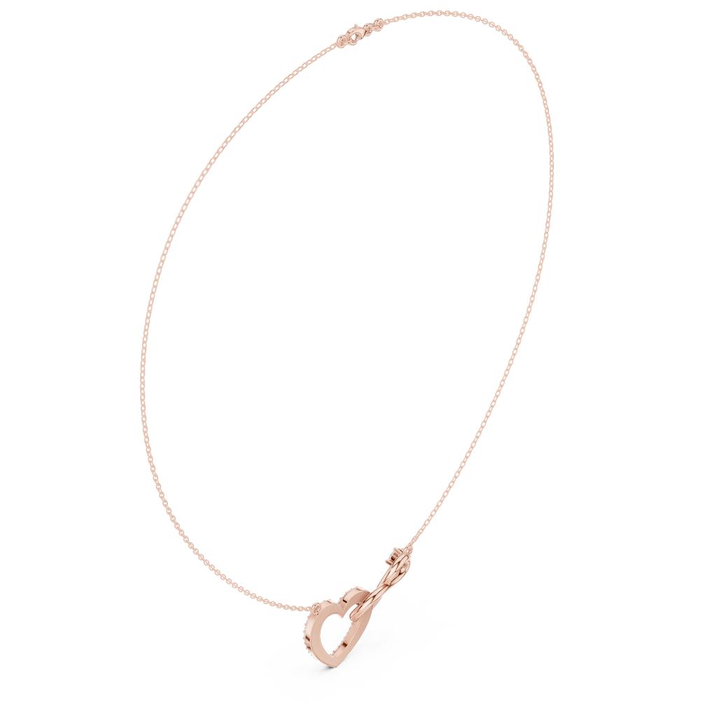 Rose gold diamond heart love knot necklace detail with heart drop charm