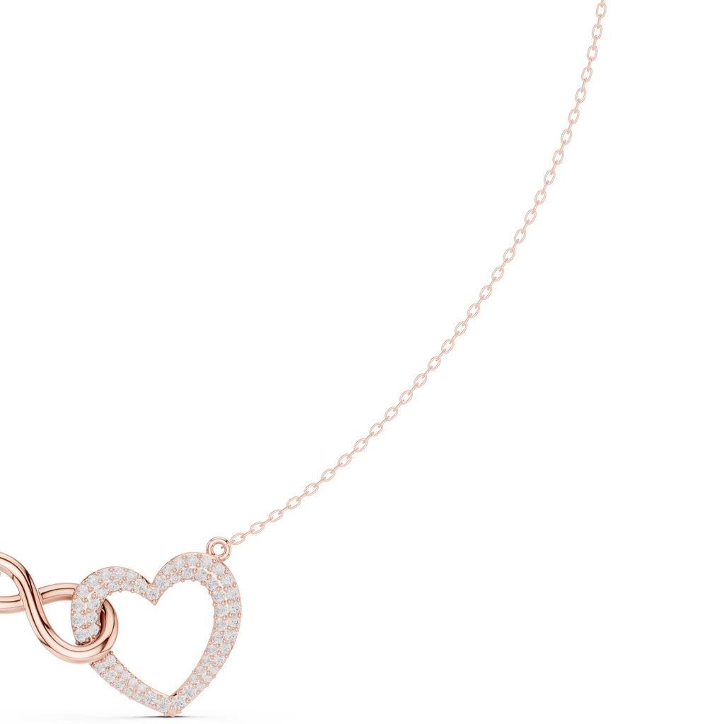 Rose gold diamond heart love knot necklace detail with heart drop charm