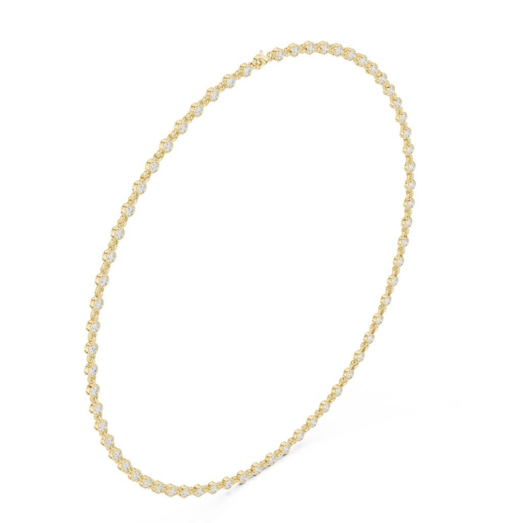 Yellow gold round-cut diamond necklace with round stones along slender chain.