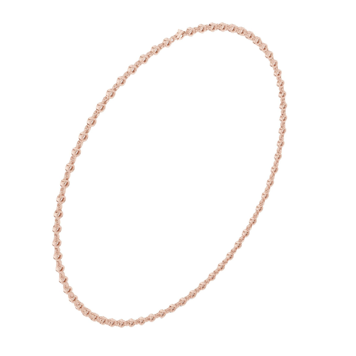Rose gold round-cut diamond necklace with round bezel-set stones on chain.