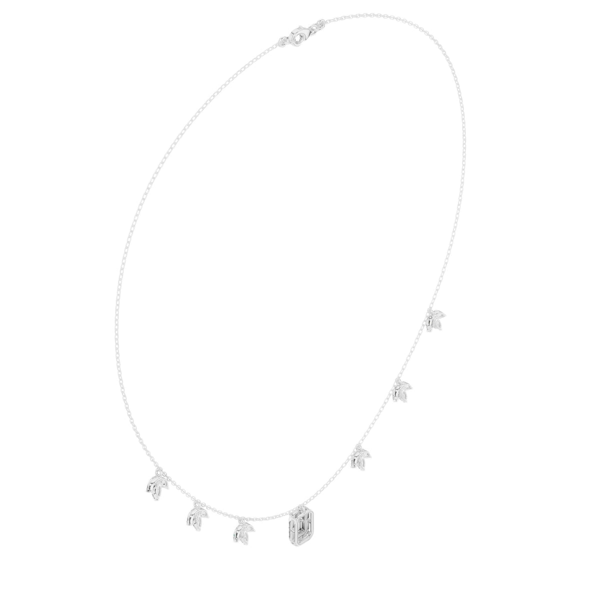 White gold diamond halo necklace with small star motifs and baguette drop pendant