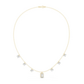 Yellow gold diamond pendant necklace with small star motifs and baguette-cut center stone