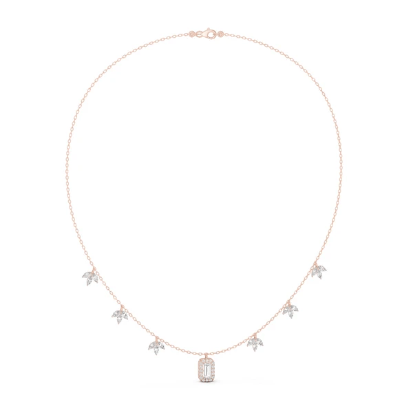 Rose gold diamond pendant necklace with small star motifs and baguette-cut center stone