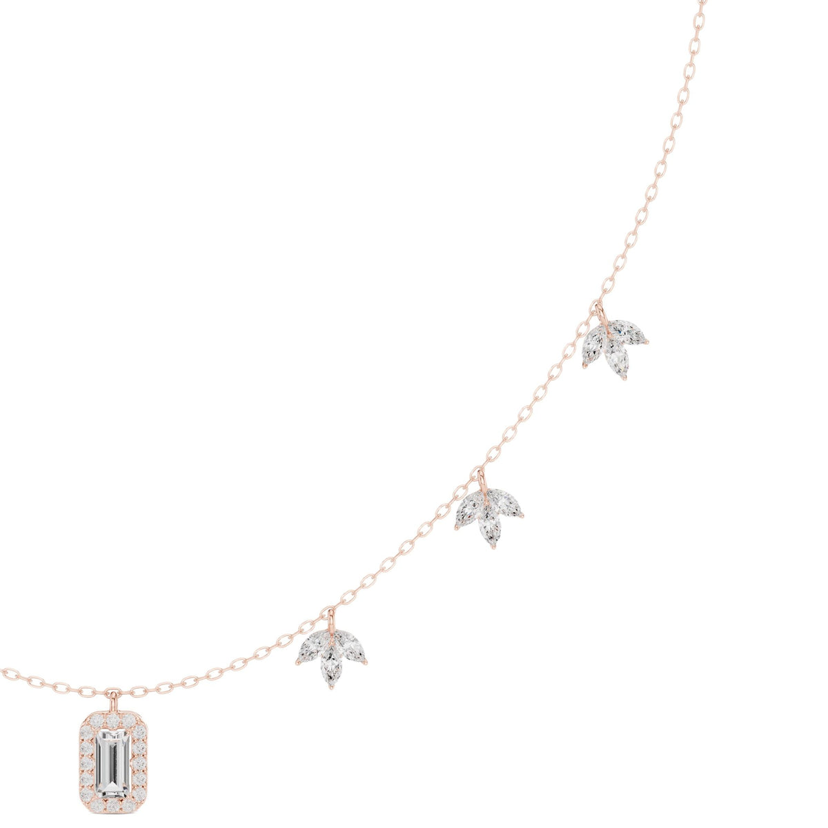 Diamond pendant necklace with baguette center stone and star accents, rose gold