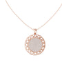 Round diamond medallion pendant on rose gold chain with openwork circular frame