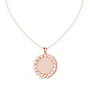 Round diamond medallion pendant on rose gold chain with circular filigree frame