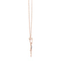 Rose gold evil eye pendant on a fine chain with a small charm drop