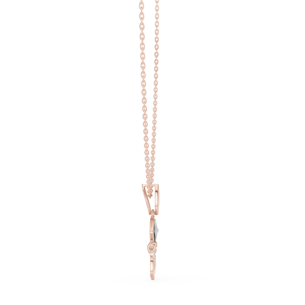 Rose gold evil eye pendant on a fine chain with a small charm drop