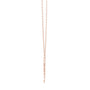 Butterfly diamond drop pendant on a rose gold chain with vertical stone drop