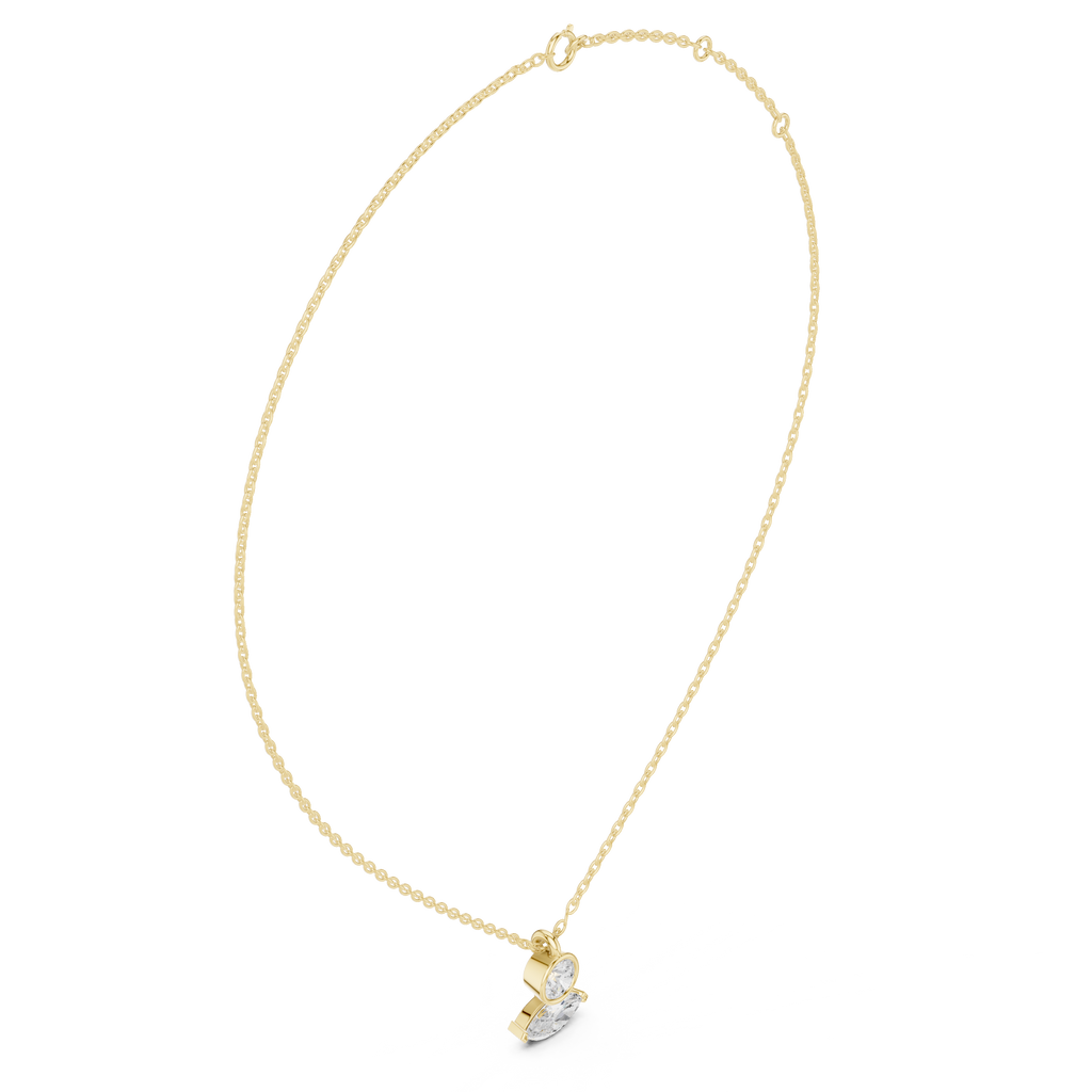 Marquise and round diamond drop pendant on yellow gold chain, close-up