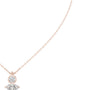 Rose gold diamond drop pendant featuring a round center stone and marquise accent