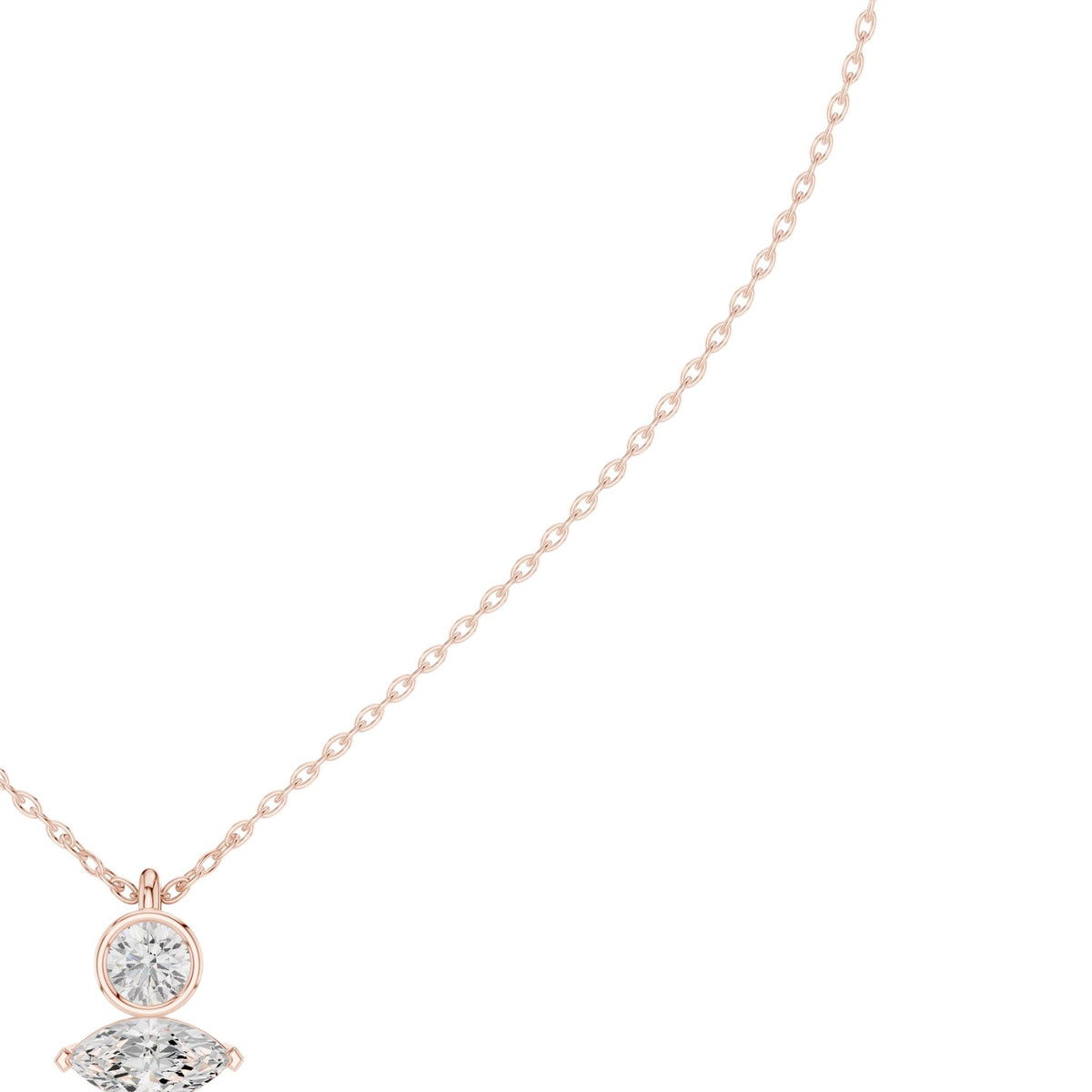 Rose gold diamond drop pendant featuring a round center stone and marquise accent