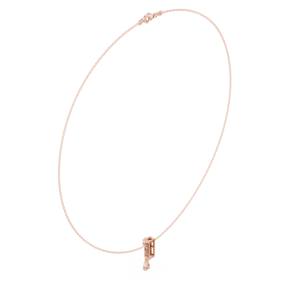 Diamond pendant necklace with pear center and baguette-style side stones