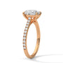 Rose gold oval diamond ring with pavé band and oval center stone