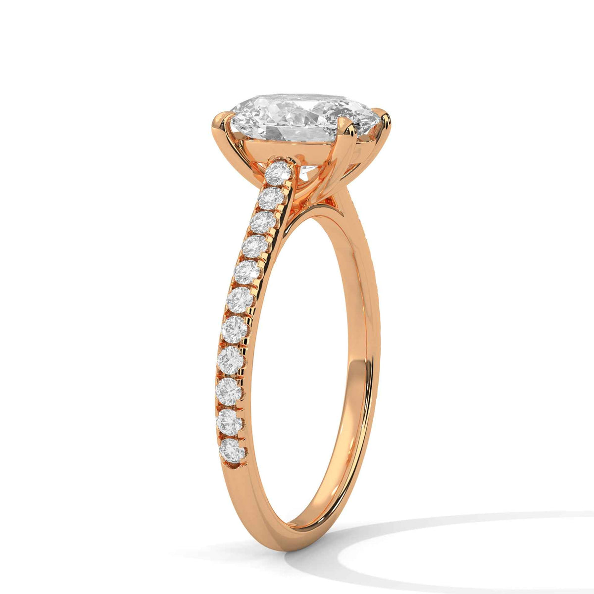 Rose gold oval diamond ring with pavé band and oval center stone