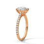 Rose gold oval diamond ring with pavé band and oval center stone