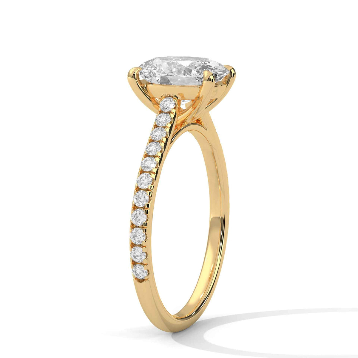Yellow gold oval diamond ring with pavé band and oval center stone