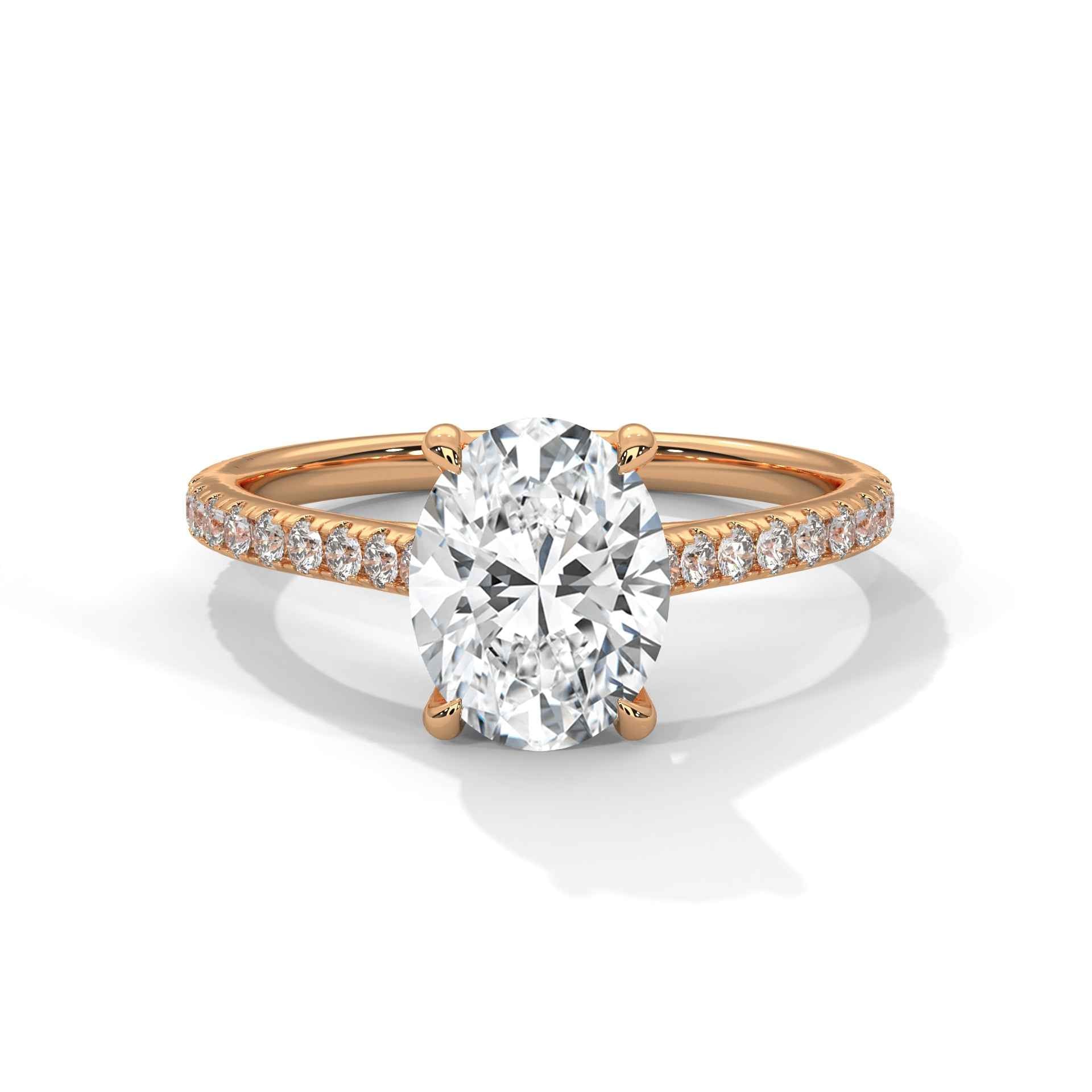 Oval engagement ring in rose gold with pavé band and cathedral-set oval center diamond