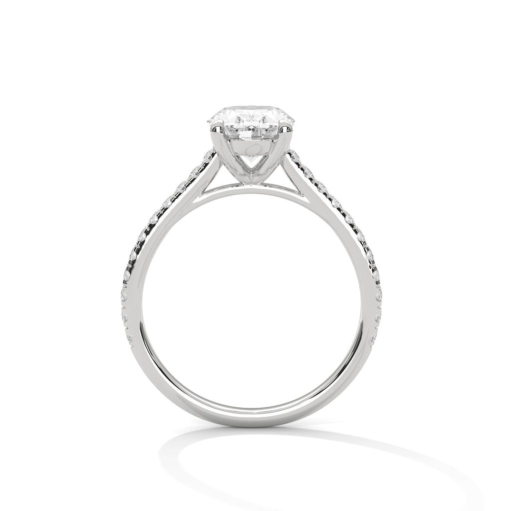 White gold ring with oval center stone in cathedral-style setting